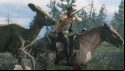 A cowboy hunting deer on horseback