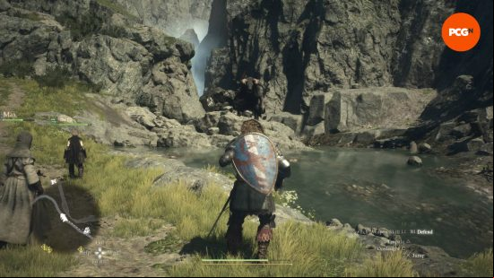 Dragon's Dogma 2 preview - a minotaur stands on a rock in the middle of a lake, having just seen a party of adventurers.
